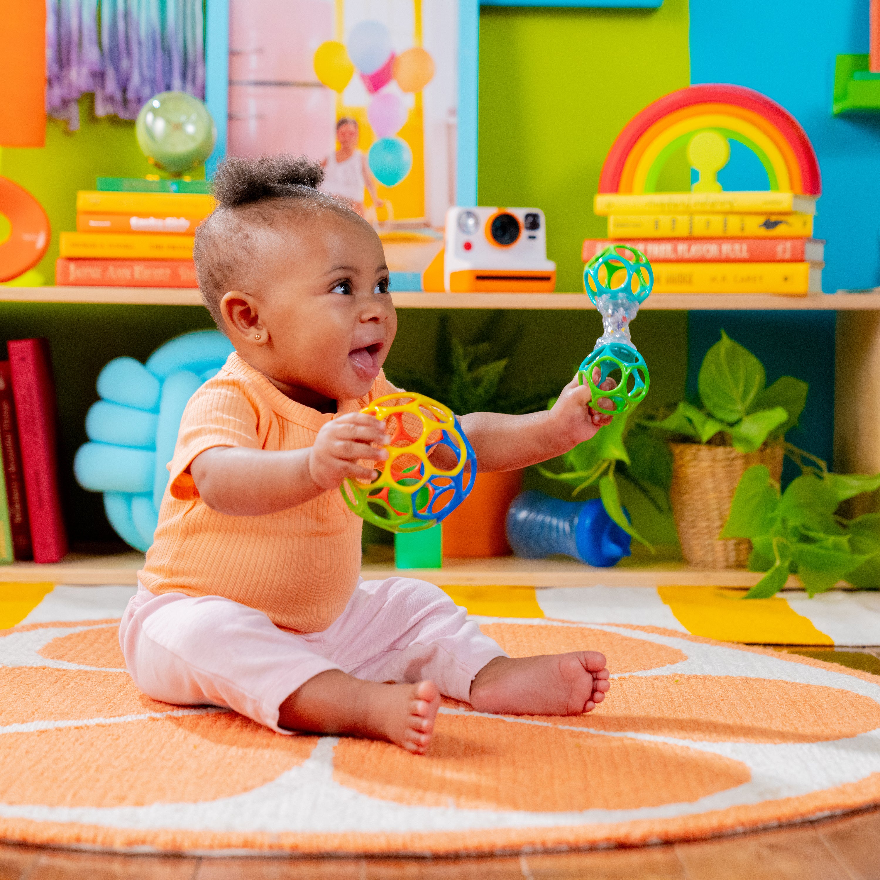 baby playing with baby enstein