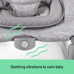 Close-up of light gray tweed 2-in-1 Bouncer & Rocker showing soothing vibration feature to calm baby