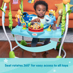 Baby playing in Disney Baby Finding Nemo Sea of Activities Jumper with 360-degree rotating seat and Nemo-themed toys