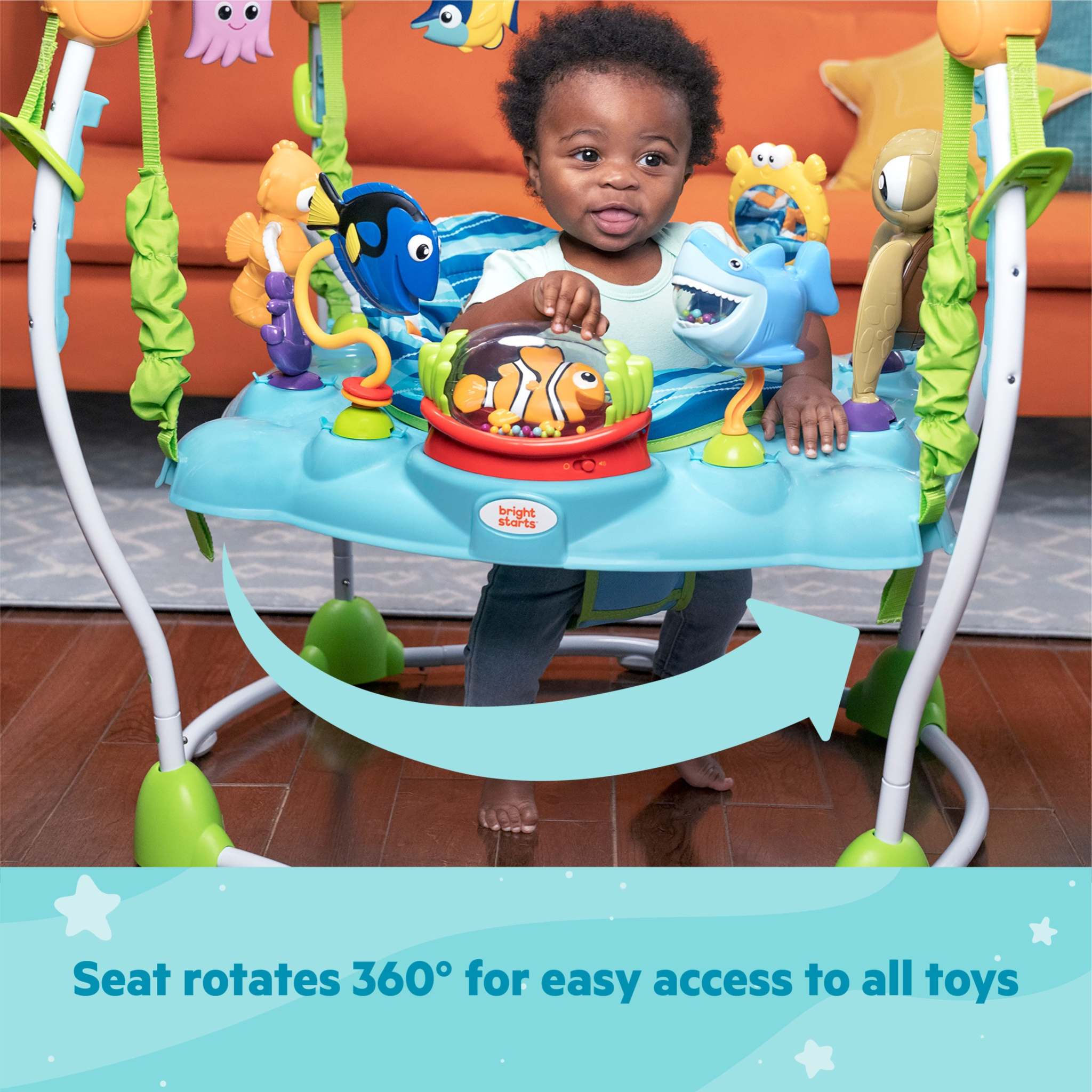 Baby playing in Disney Baby Finding Nemo Sea of Activities Jumper with 360-degree rotating seat and Nemo-themed toys