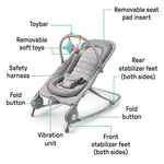 Light gray tweed 2-in-1 Bouncer & Rocker with removable toy bar, safety harness, vibration unit, and folding stabilizer feet for infants.