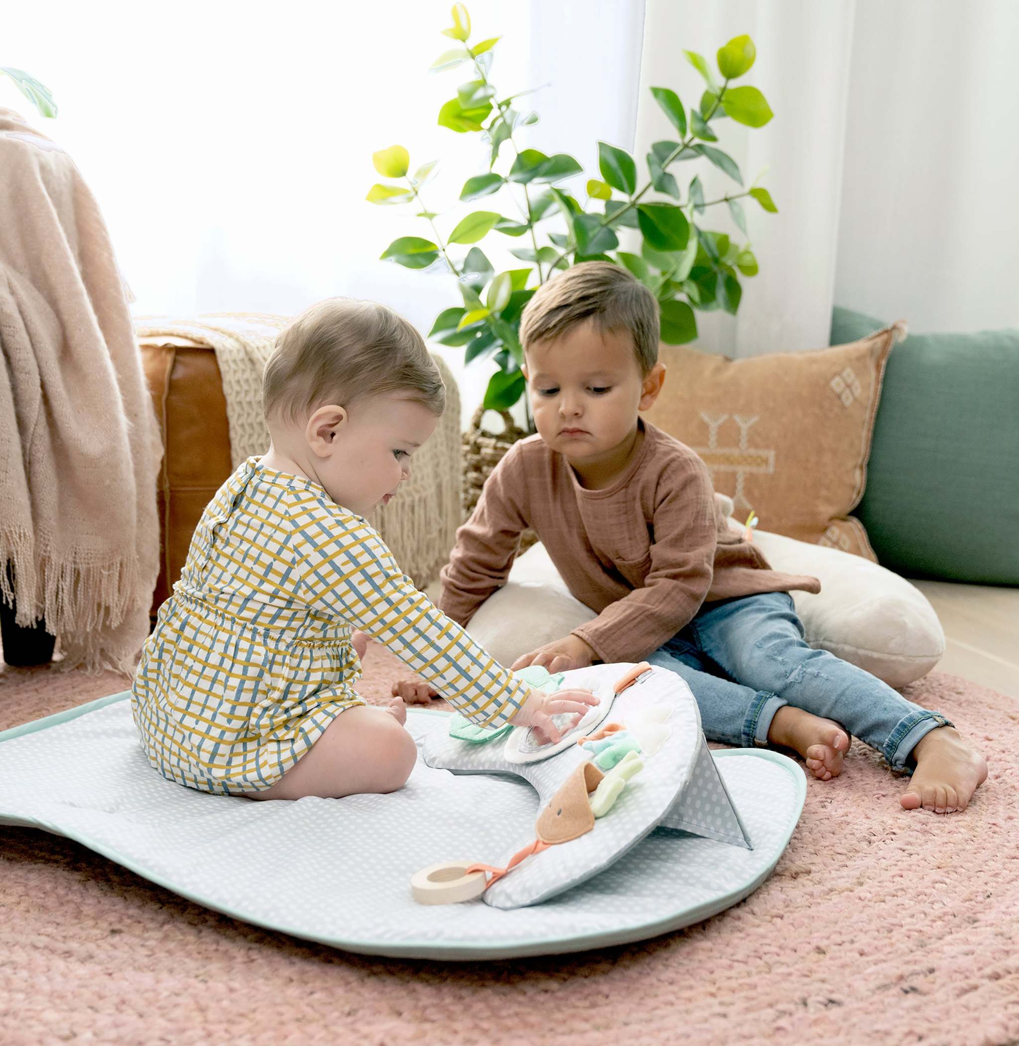 two boys using cozy prop 4-in-1 sit up & prop activity mat - nate