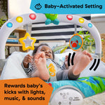 Baby enjoying Baby Einstein Kick to It Neptune Musical Bouncer with lights and sounds.