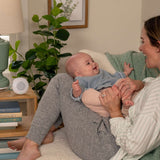mother and baby with pock-a-bye baby streaming music player & soother