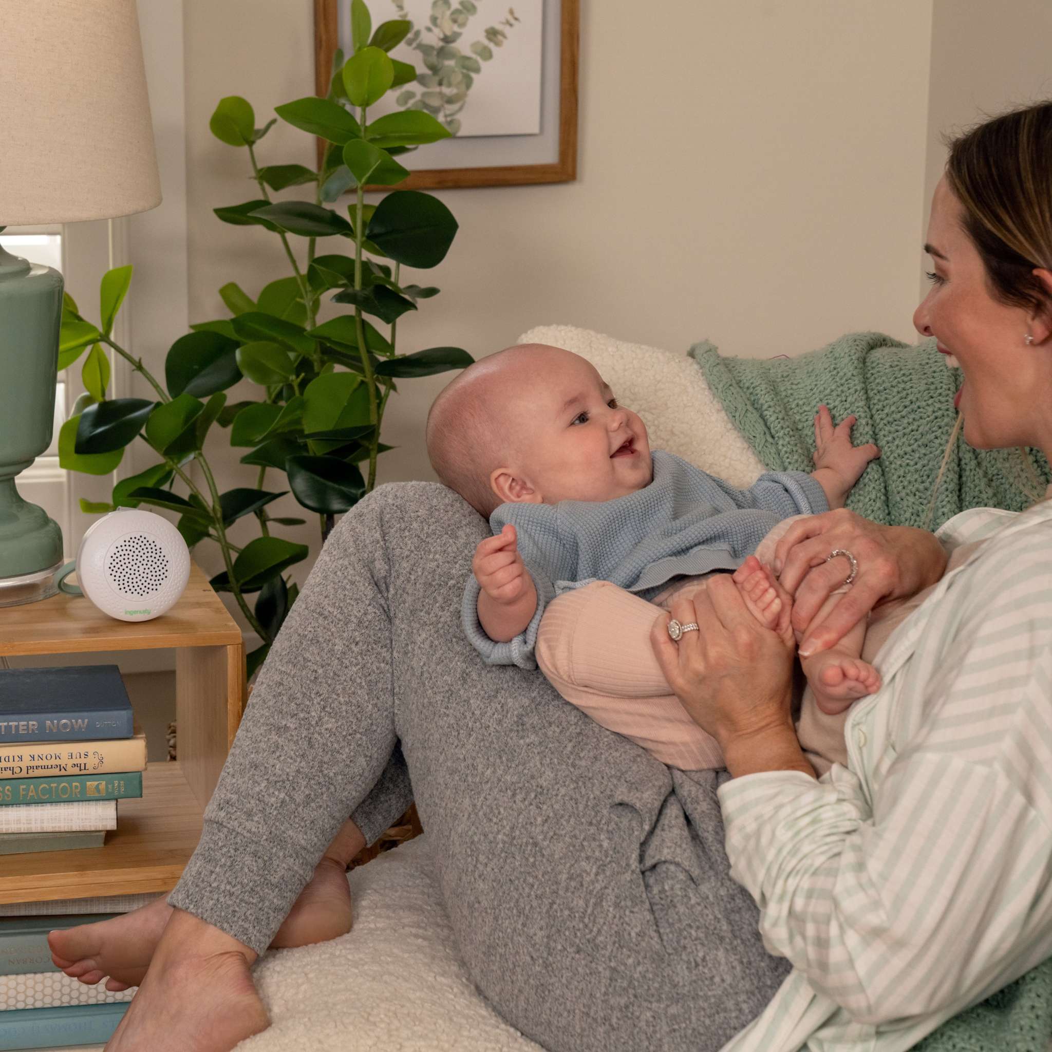 mother and baby with pock-a-bye baby streaming music player & soother