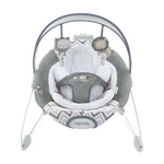 Ingenuity SmartBounce Automatic Bouncer Braden with plush fabrics and overhead toy bar.