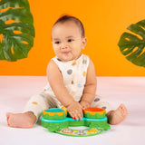 child playing with a Safari Beats™ Musical Toy