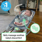 baby sitting in happy belly rock-to-bounce massage seat - parker