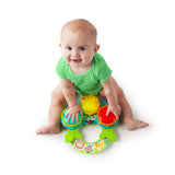 child playing with a Safari Beats™ Musical Toy