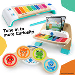 Magic Touch Piano Musical Toy for toddlers with colorful keys and music sheets.