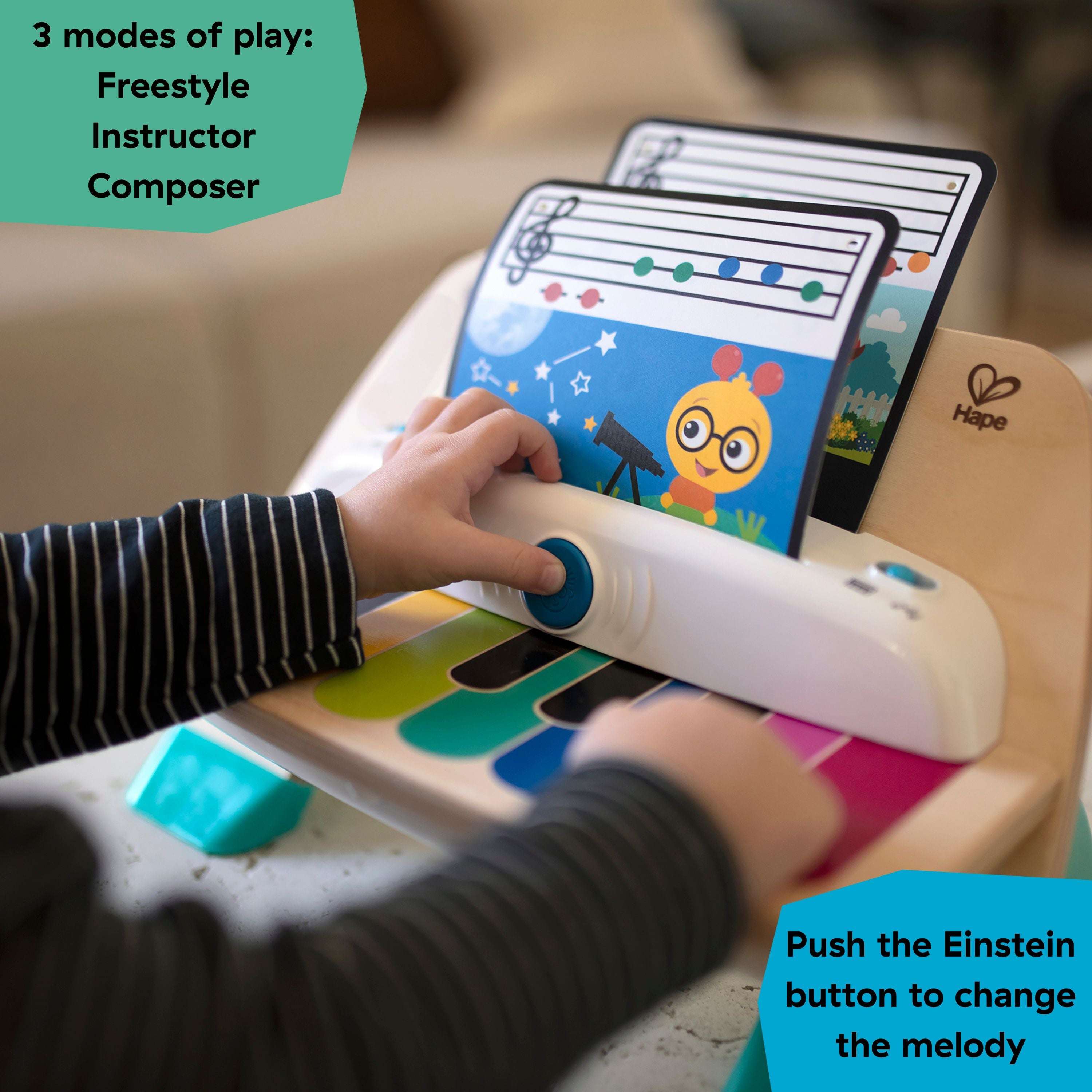 Baby Einstein Magic Touch Piano musical toy with child playing color-coded keys, featuring three modes of play and colorful music sheets.
