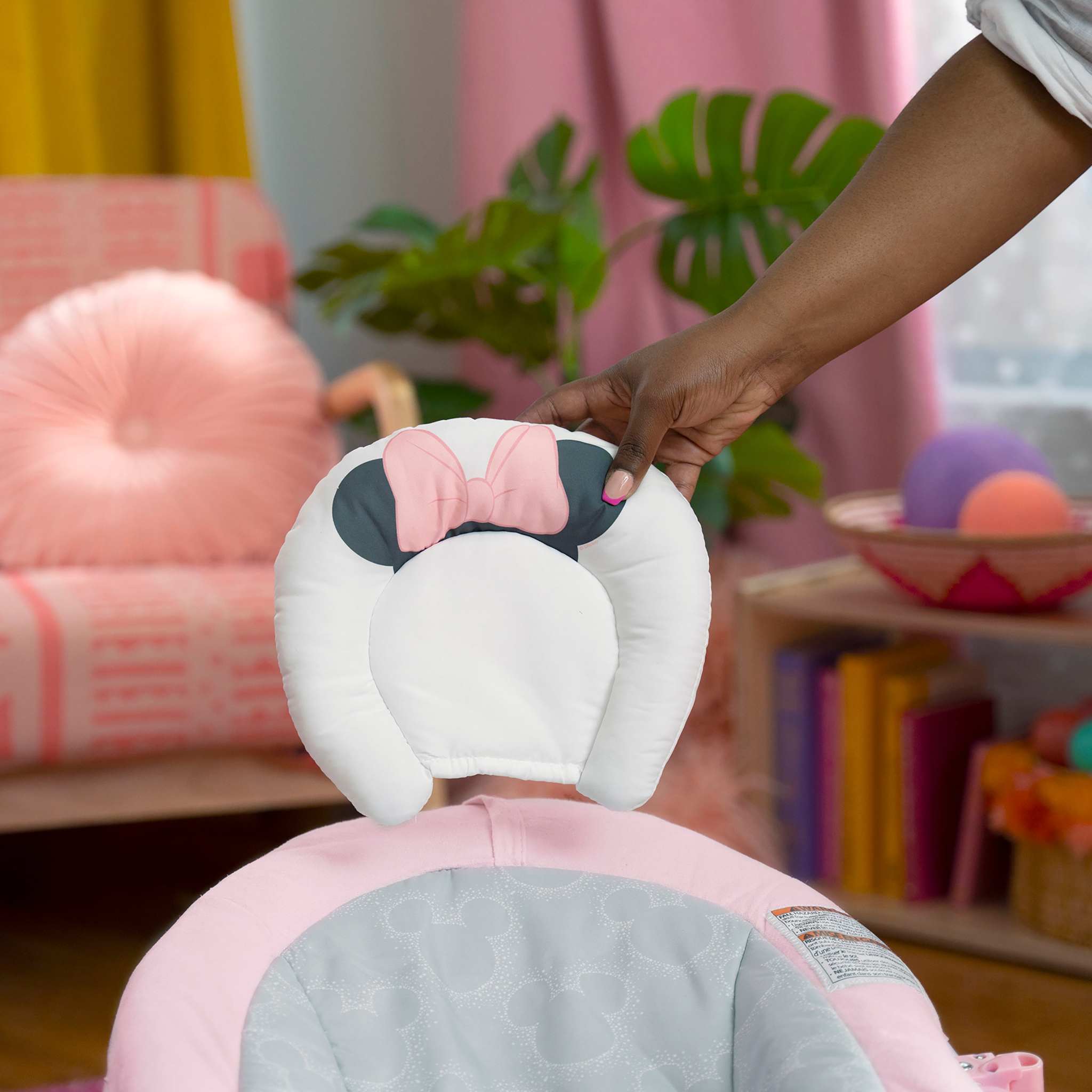 MINNIE MOUSE Rosy Skies ™ Comfy Bouncer with pink and gray design, featuring Minnie Mouse ears and bow for baby girls.