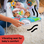 Baby enjoying Baby Einstein Kick to It Neptune Musical Bouncer with sensory toys and vibrations.