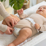 baby using a summer by ingenuity contoured changing pad