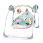 Bright Starts Whimsical Wild Portable Swing with elephant and monkey toys, colorful design, and adjustable seat.