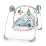Bright Starts Whimsical Wild Portable Swing with elephant and monkey toys, colorful design, and adjustable seat.