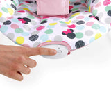 Minnie Mouse Spotty Dotty Vibrating Bouncer for Babies with pink polka-dot fabric and vibration button.