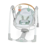 Ingenuity Cozy Spot portable baby swing with plush seat, wooden toy bar, interactive toys, USB-powered, foldable design