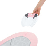 Minnie Mouse Rosy Skies Comfy Bouncer with plush pillow and Minnie ears being assembled.