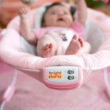 MINNIE MOUSE Rosy Skies ™ Comfy Bouncer with baby, pink design, and Bright Starts control panel.