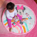 MINNIE MOUSE Forever Besties Activity Gym with baby on colorful pink and rainbow mat featuring Disney's Minnie Mouse design.