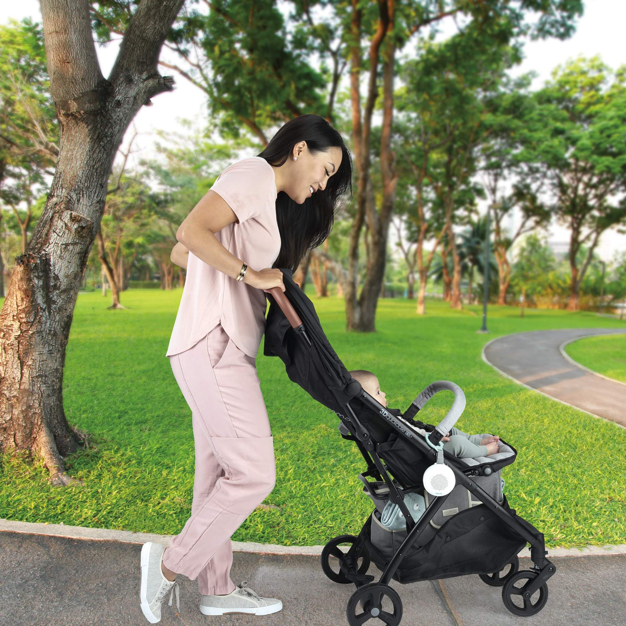 mother and baby with pock-a-bye baby streaming music player & soother