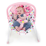 Minnie Mouse Spotty Dotty Vibrating Bouncer for babies with pink polka-dotted design and plush fabric.