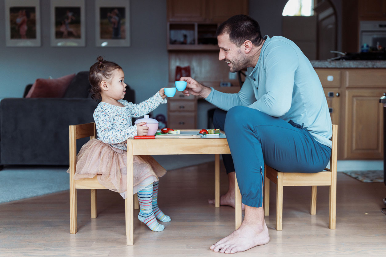 father daughter playing
