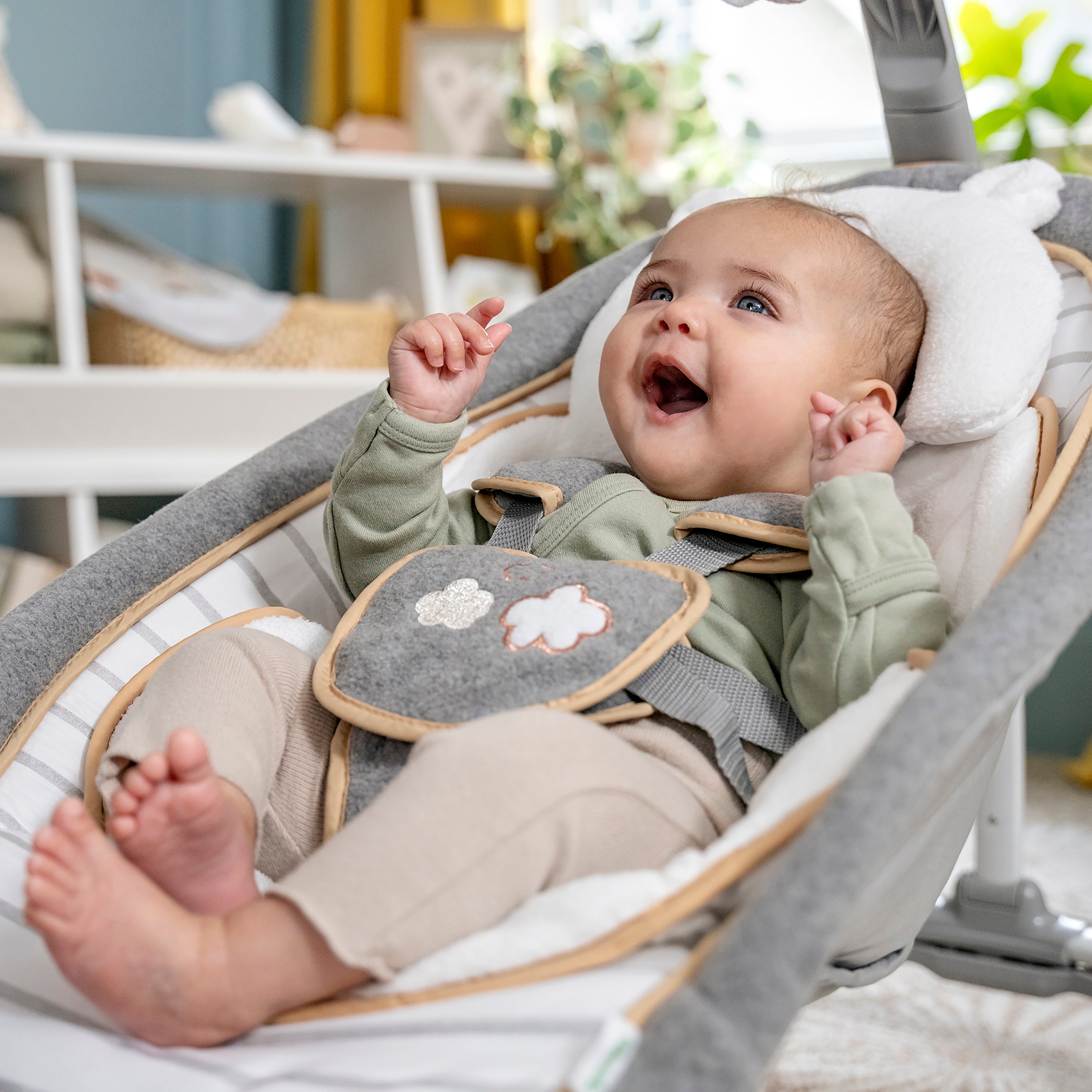 Automatic baby bouncer with soft fabric and secure harness for infant comfort and safety