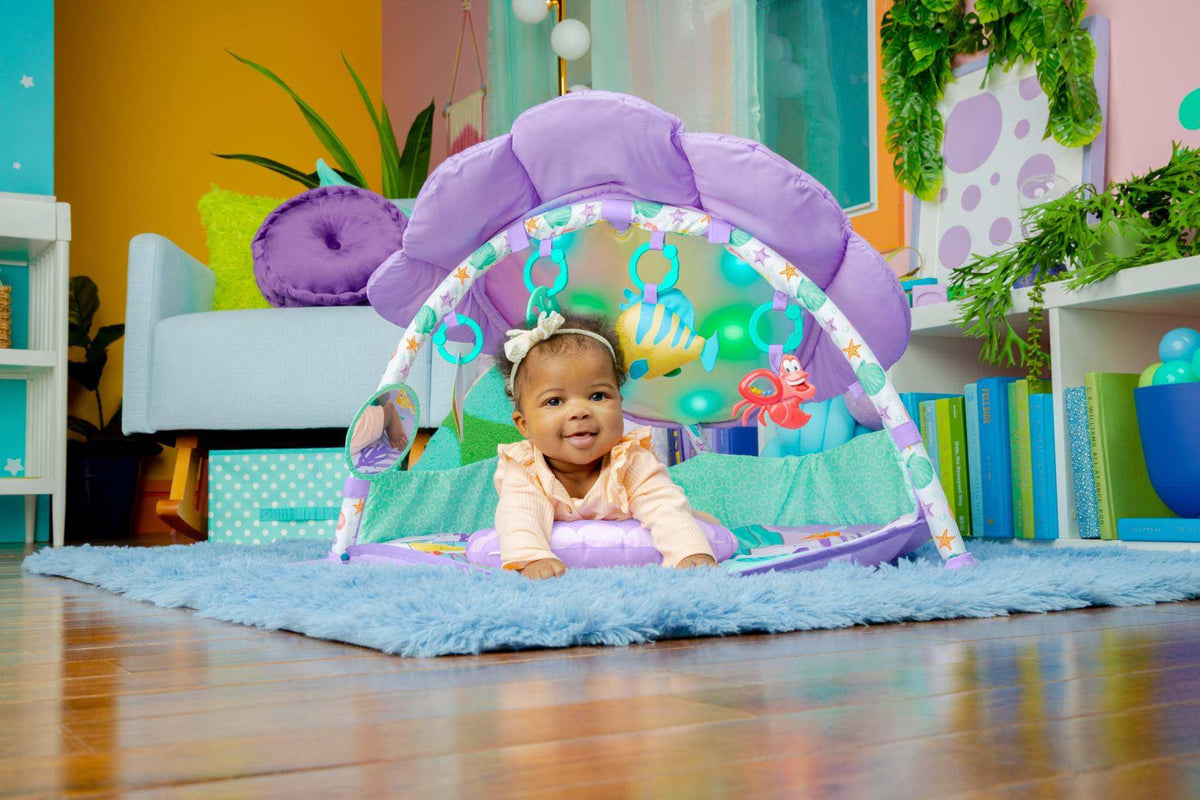 Disney baby play gym with Mickey and Winnie the Pooh characters