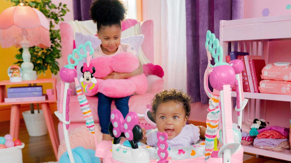 Disney baby walkers and activity centers with Mickey and Minnie Mouse themes