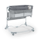 Ingenuity Dream and Grow Bedside Bassinet with breathable mesh sides and adjustable height for newborns to 12 months