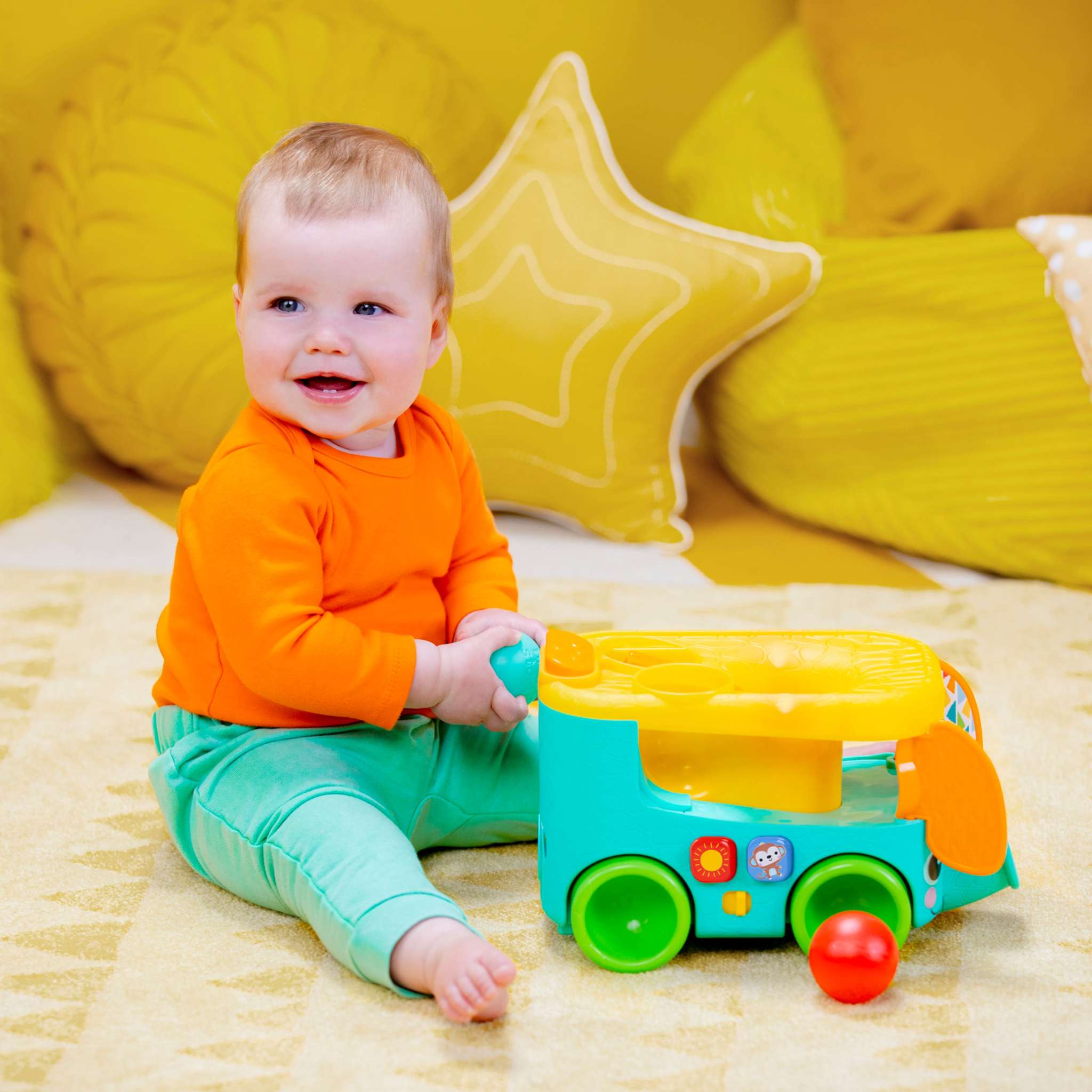 Bright Starts Pop & Roll Safari Bus baby toy with jungle theme, balls, lights, and sounds