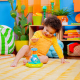 Press & Glow Spinner baby toy with spinning star, lights, and melodies for infants 6-36 months to encourage fine motor skills and cause-effect learning