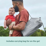 Bright Starts Disney Baby Pop 'N Sit portable booster seat with Winnie the Pooh design for babies and toddlers