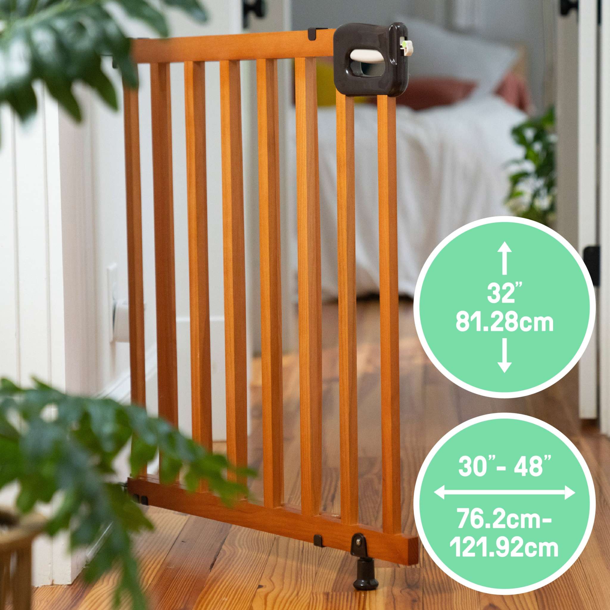 Ingenuity The Stairway 48W Series brown wood safety gate for stairs and hallways with locking indicator and comfort grip handle