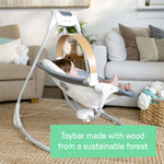 SimpleComfort Compact Swing Parker with rotating wooden toy bar and interactive toys for baby entertainment