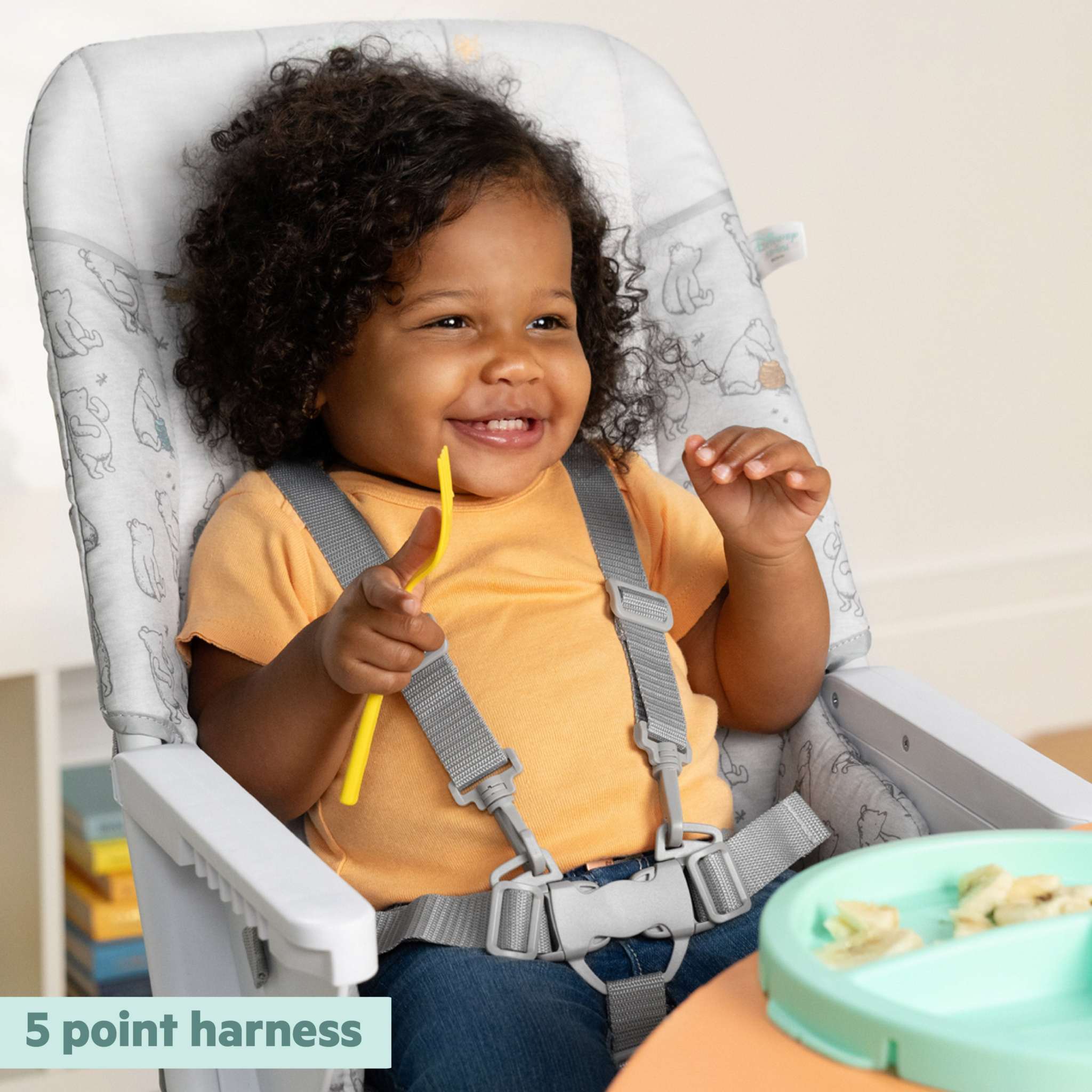 Winnie the Pooh Compact High Chair with foldable design and 3-section Twist N Dine plate for baby self-feeding