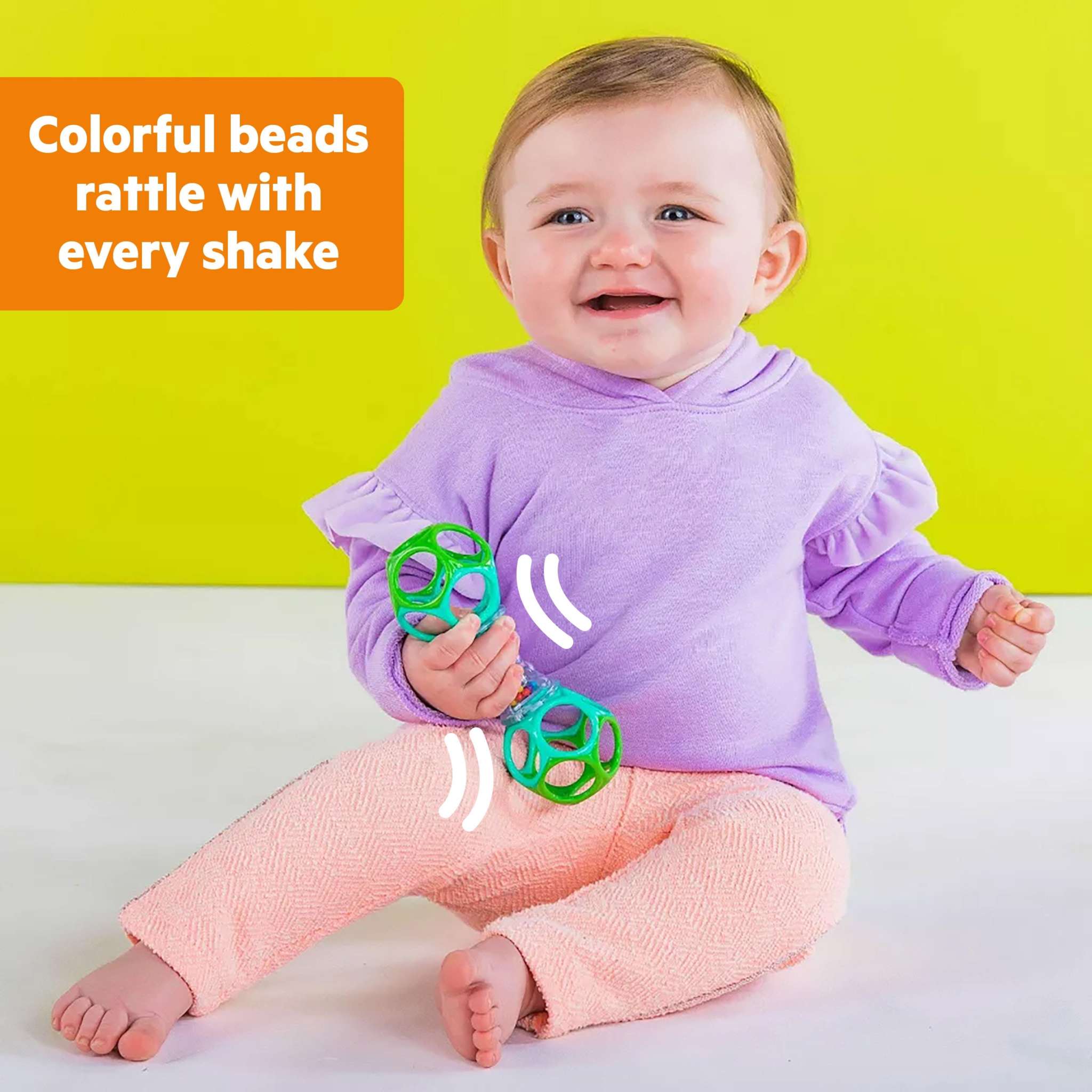 Baby playing with Bright Starts Wobble & Rattle Gift Set featuring colorful beads and flexible oball shaker toy