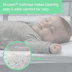 Ingenuity Dream and Grow Bedside Bassinet with mesh sides and adjustable height for newborns to 12 months