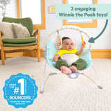 Disney Baby Winnie the Pooh Hunny Hues Vibrating Bouncer with hanging toys and secure harness for infants 0-6 months