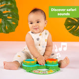 Baby playing with Bright Starts Safari Sounds Gift Set musical drum toy with colorful lights and jungle animal designs