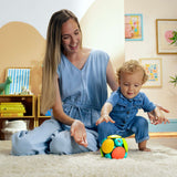 Mother and baby playing with Bright Starts Wobble & Rattle Gift Set toys on carpet