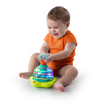 Bright Starts Press & Glow Spinner baby toy with spinning star, lights, and melodies for infants 6-36 months