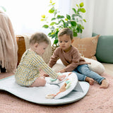 two boys using cozy prop 4-in-1 sit up & prop activity mat - nate