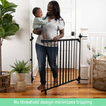 Ingenuity Stairway+ 46W Series black metal baby and pet safety gate installed in a doorway