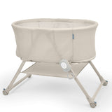 Ingenuity Snooze & Stow Easy-Folding Bassinet with Sound, Light & Vibration - Sand