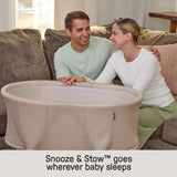 Ingenuity Snooze & Stow Easy-Folding Bassinet with Sound, Light & Vibration - Sand