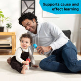 Baby playing with Baby Einstein First Tunes maracas and adult engaging in cause and effect learning activity