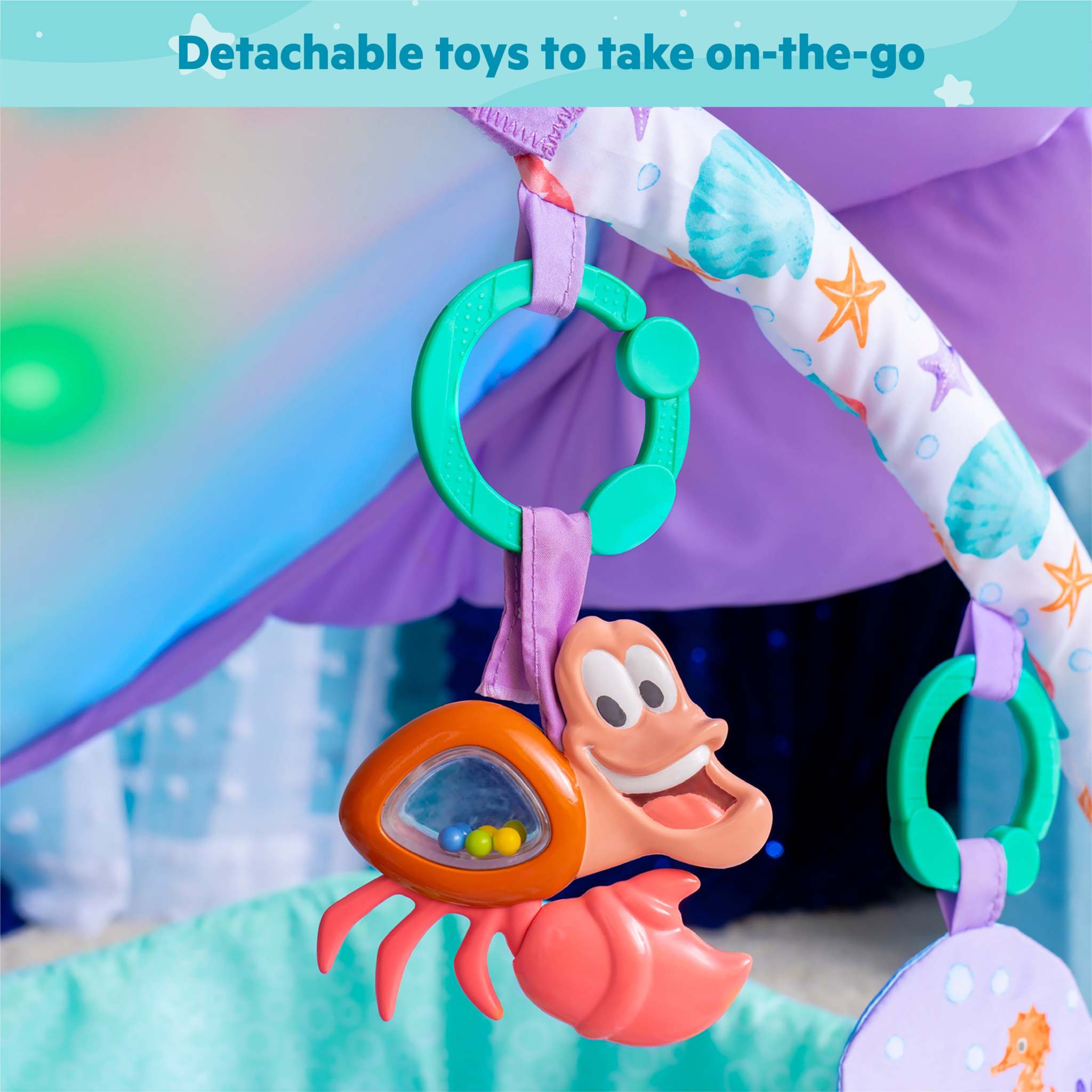 MERMAID Twinkle Trove Lights & Music Activity Gym with detachable Little Mermaid-themed toys.